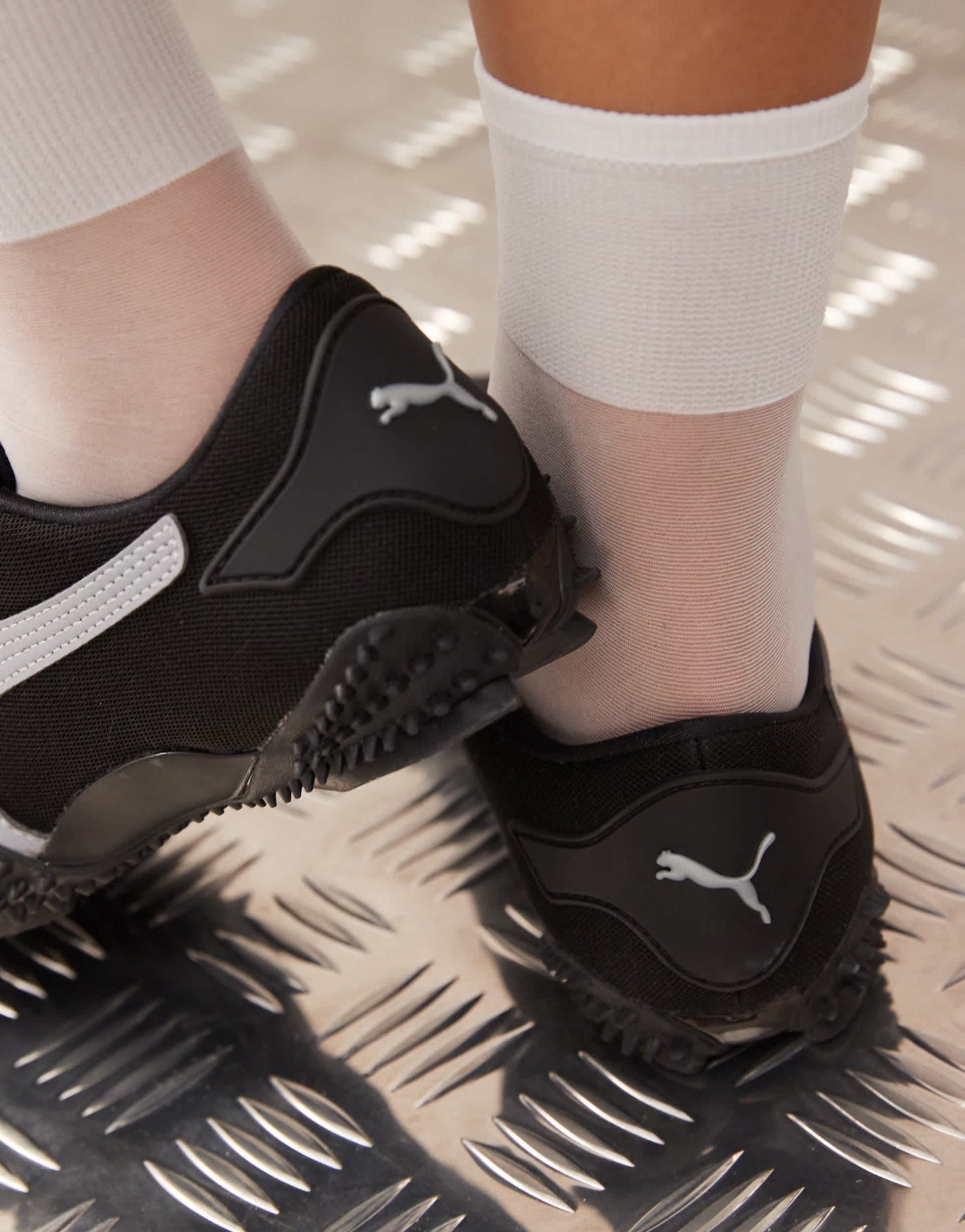 Puma Mostro trainers in black & silver - ASOS Sample Sale