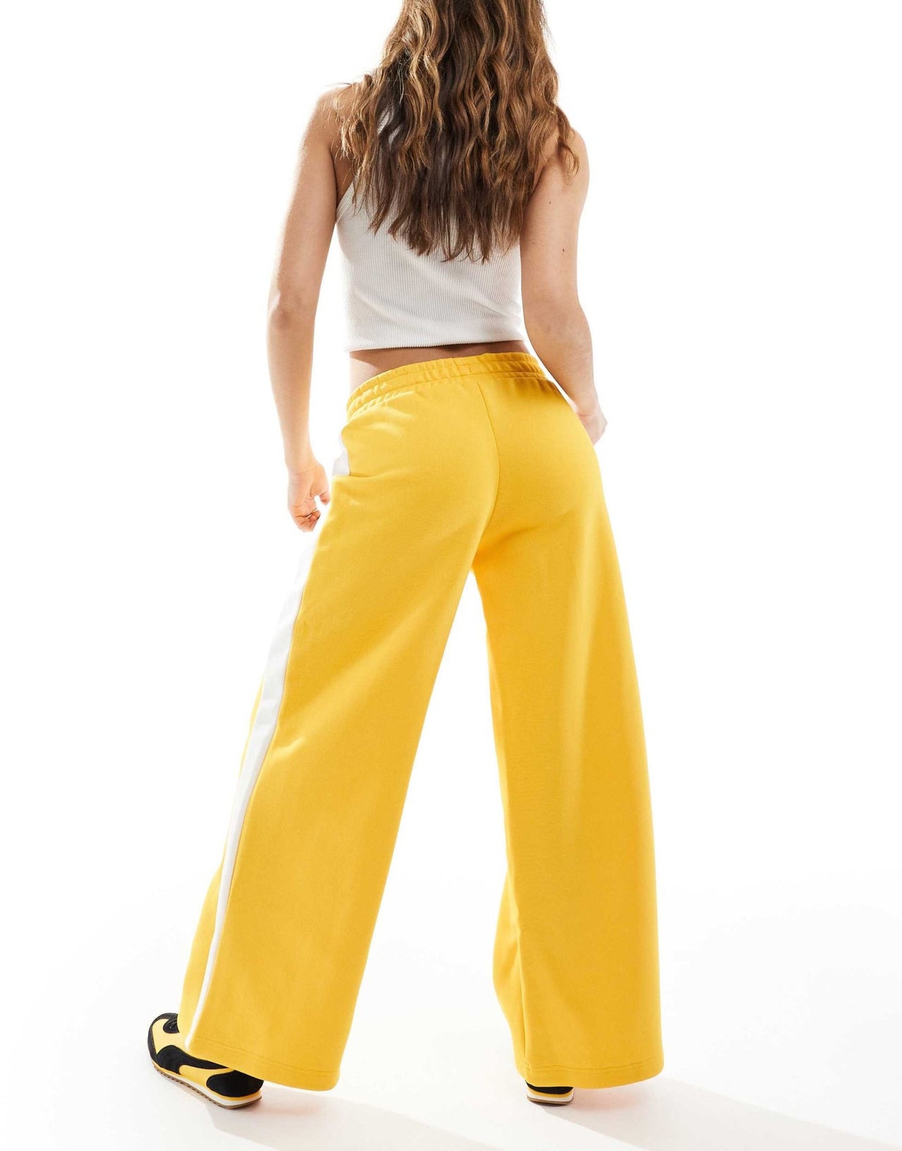 Puma T7 low rise track trousers in yellow - ASOS Sample Sale