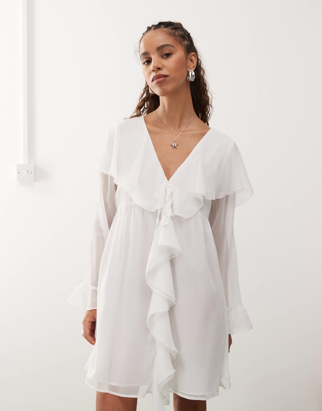 Reclaimed Vintage mini dress with centre front ruffle in white - ASOS Sample Sale
