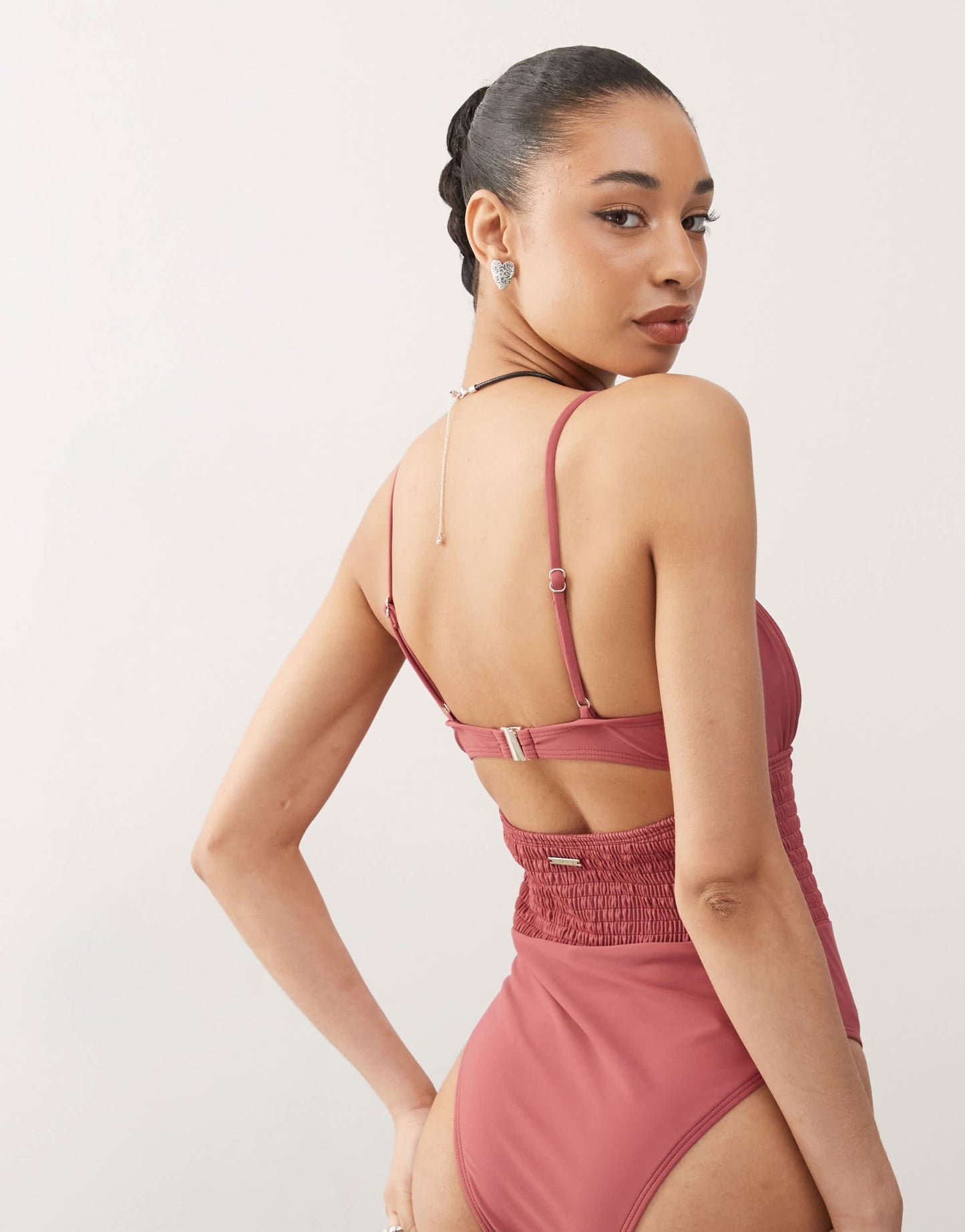 Reclaimed Vintage swimsuit with shirred waist and cut out detail in pink - ASOS Sample Sale