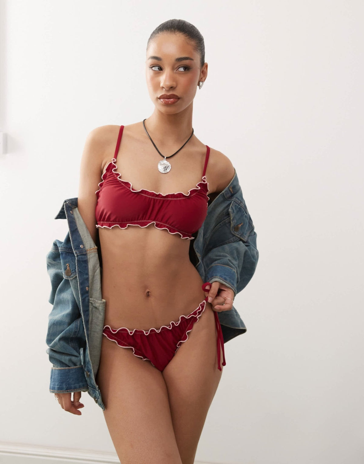 Reclaimed Vintage tie side bikini bottoms with frills in burgundy - ASOS Sample Sale