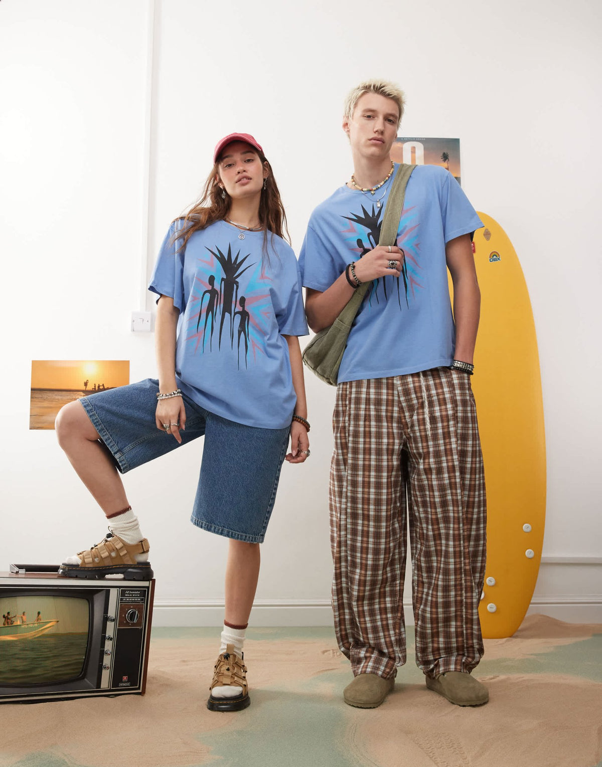 Reclaimed Vintage x Outer Banks unisex t-shirt with graphic in washed blue - ASOS Sample Sale