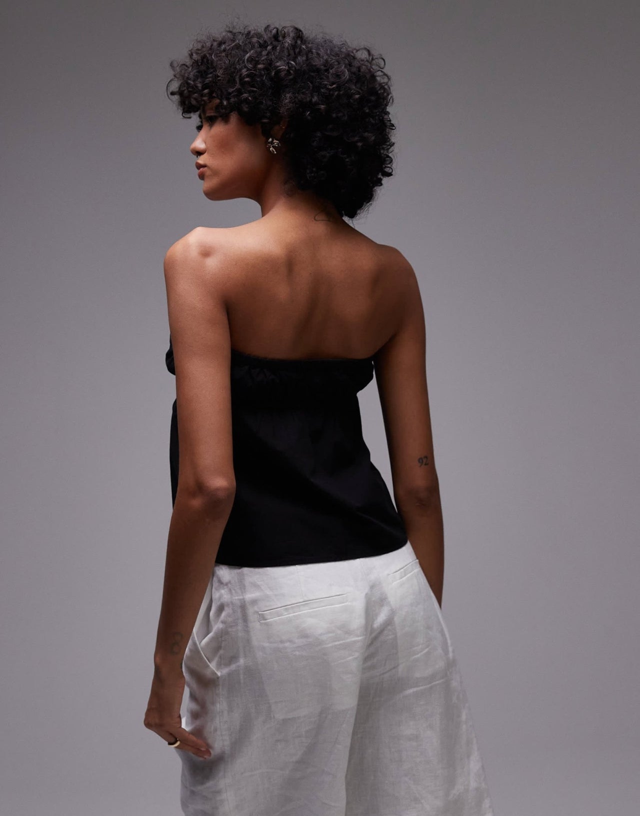 Rhythm posie gathered strapless top in black - ASOS Sample Sale