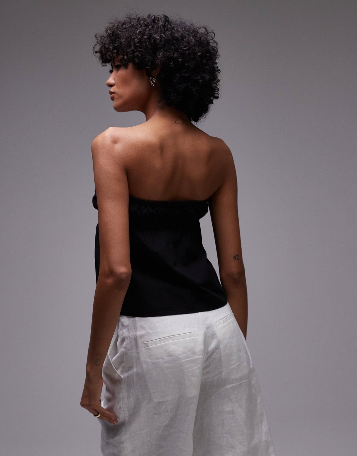 Rhythm posie gathered strapless top in black - ASOS Sample Sale