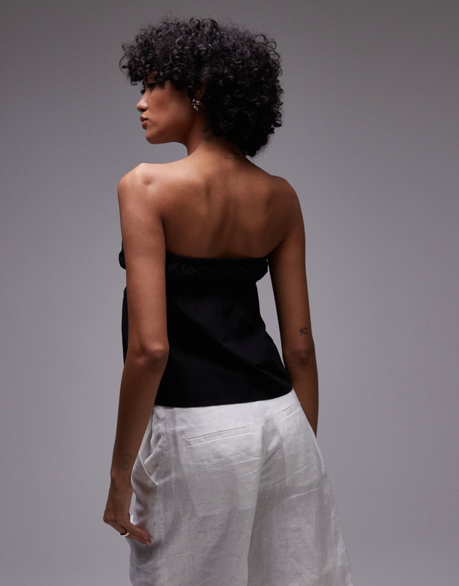 Rhythm posie gathered strapless top in black - ASOS Sample Sale
