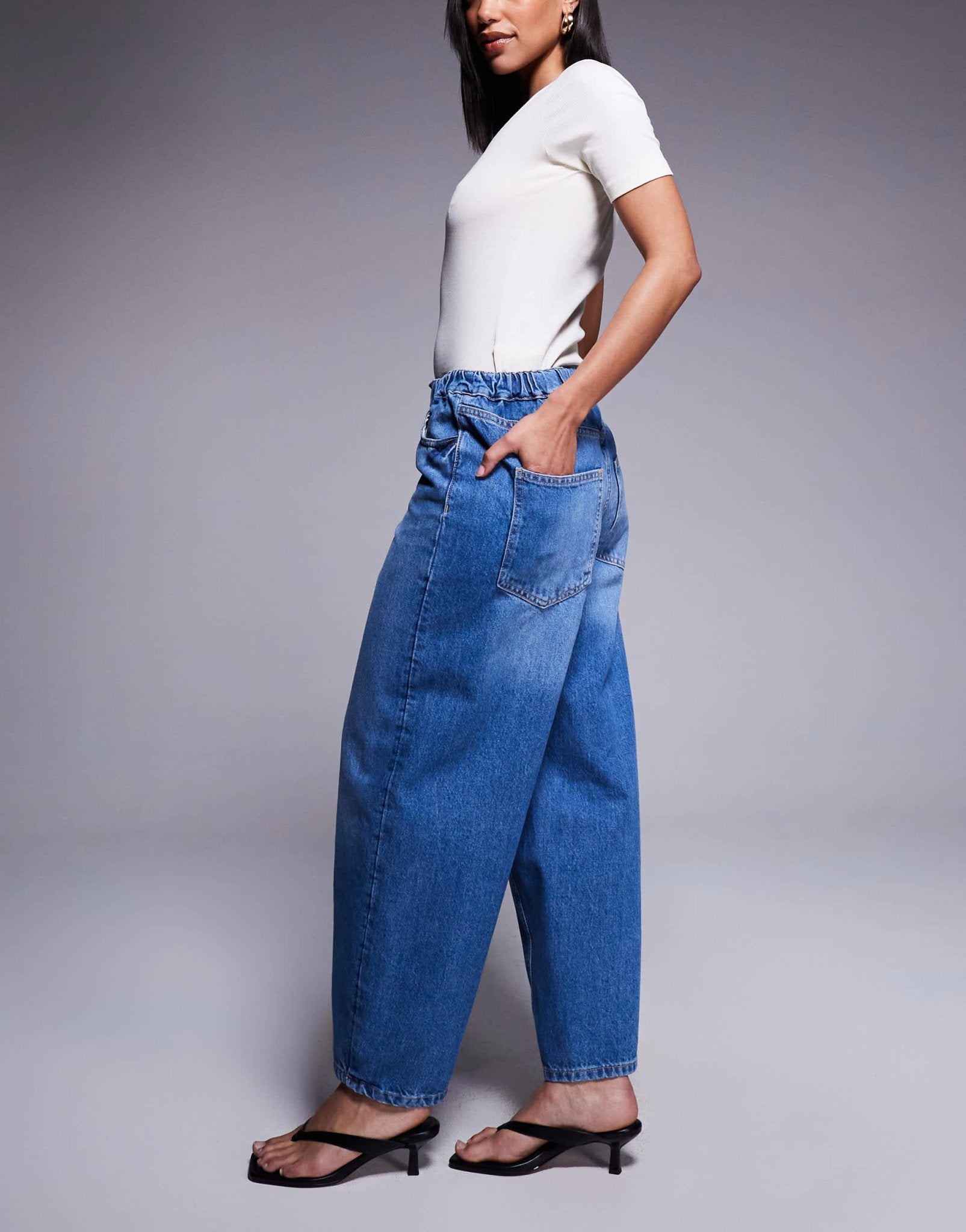 River Island elasticated barrel jeans in midwash blue - ASOS Sample Sale