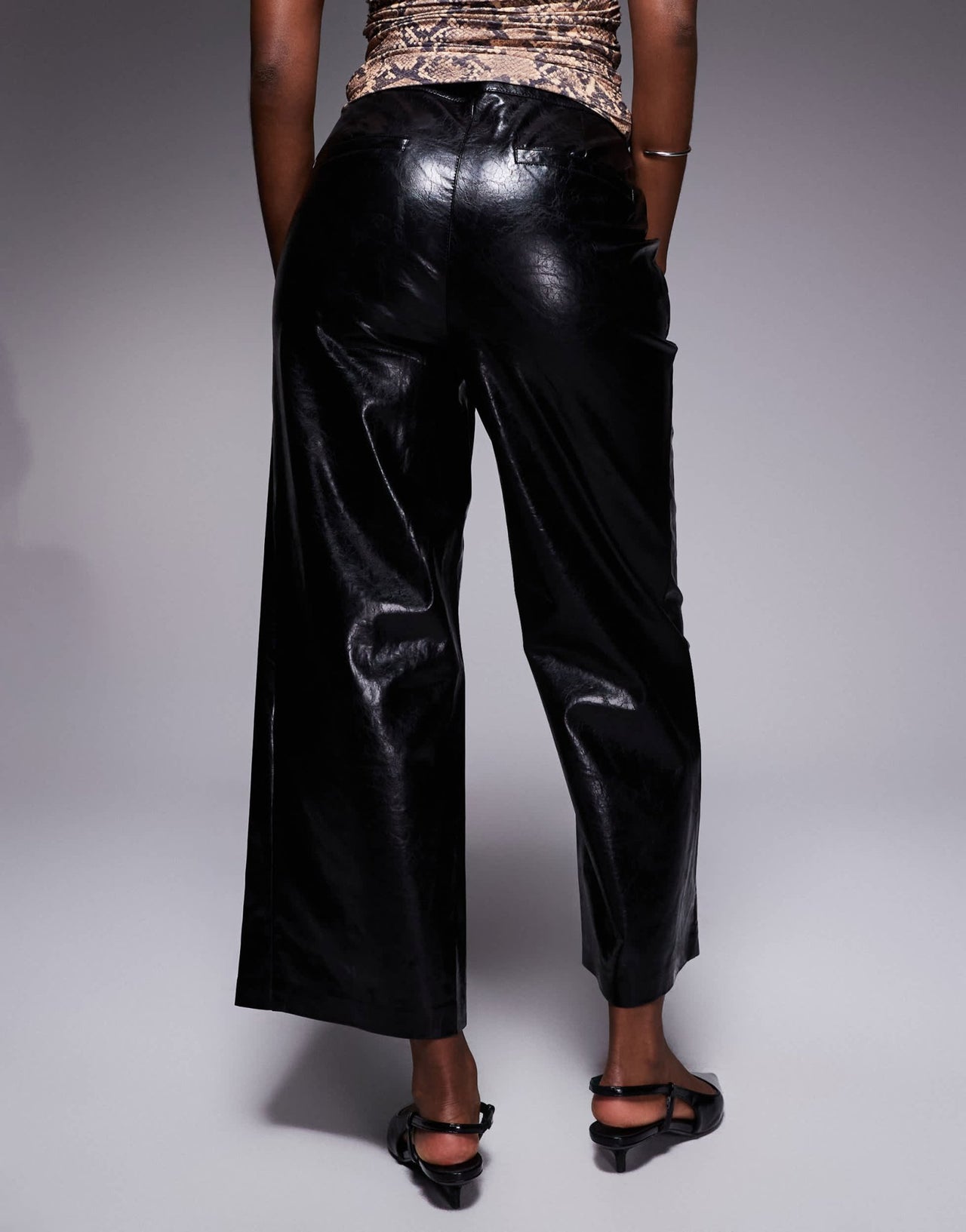 River Island faux leather cropped buckle trouser in black - ASOS Sample Sale