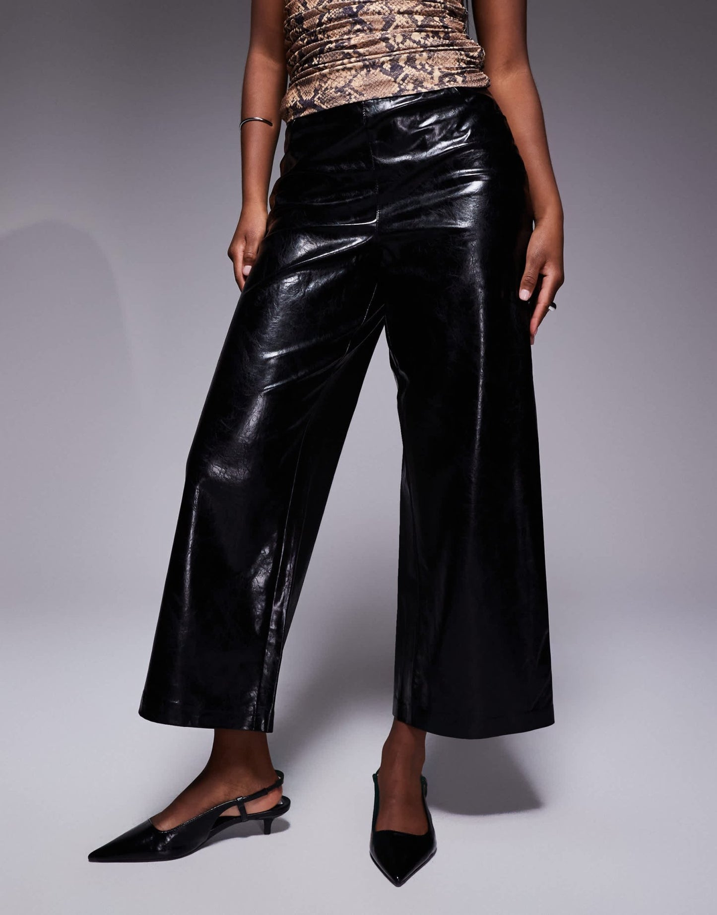 River Island faux leather cropped buckle trouser in black - ASOS Sample Sale