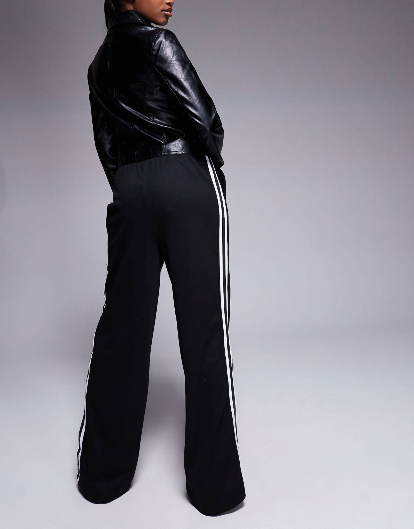 River Island wide leg joggers with side stripe in black - ASOS Sample Sale