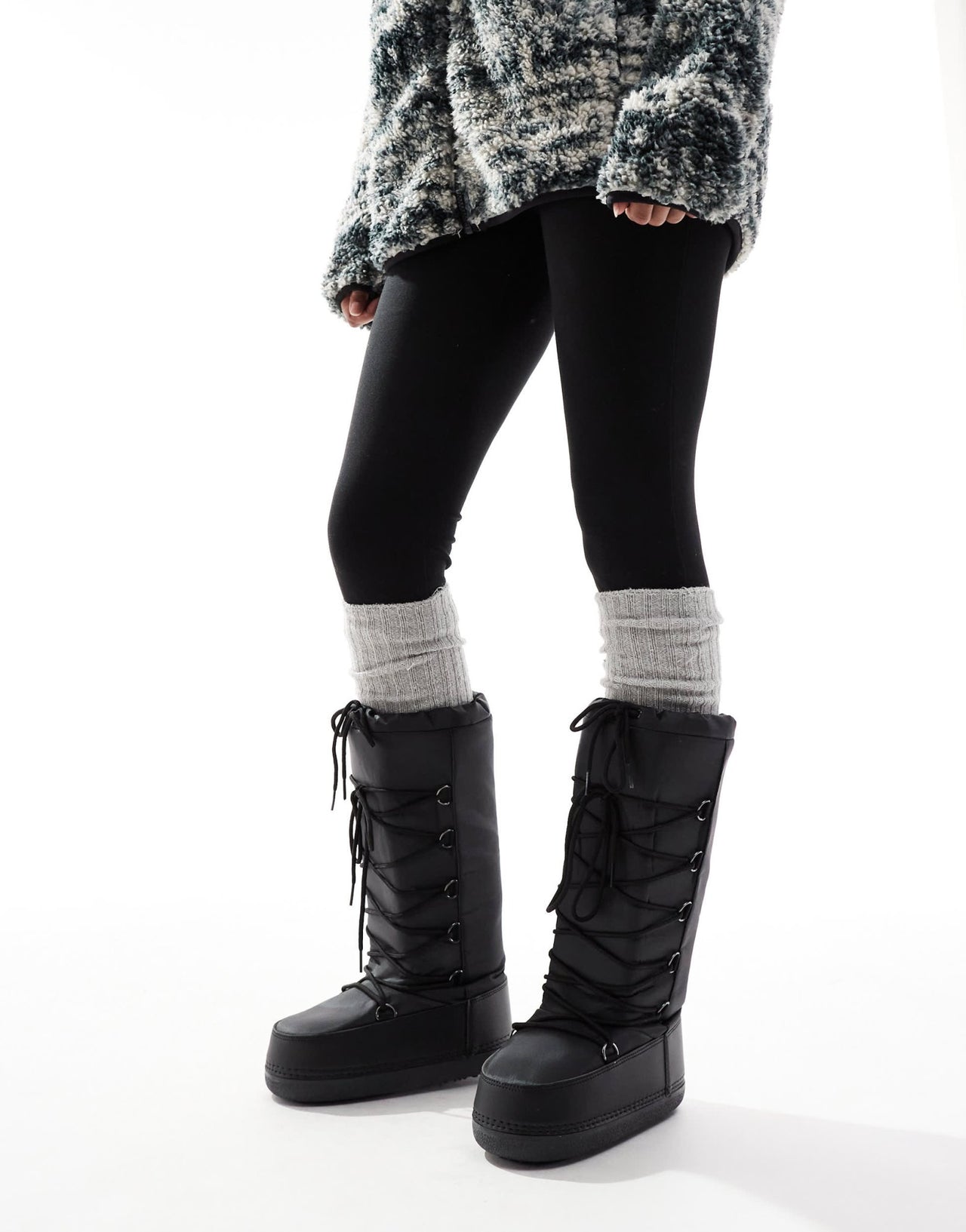 SEQWL knee high snow boots in black - ASOS Sample Sale