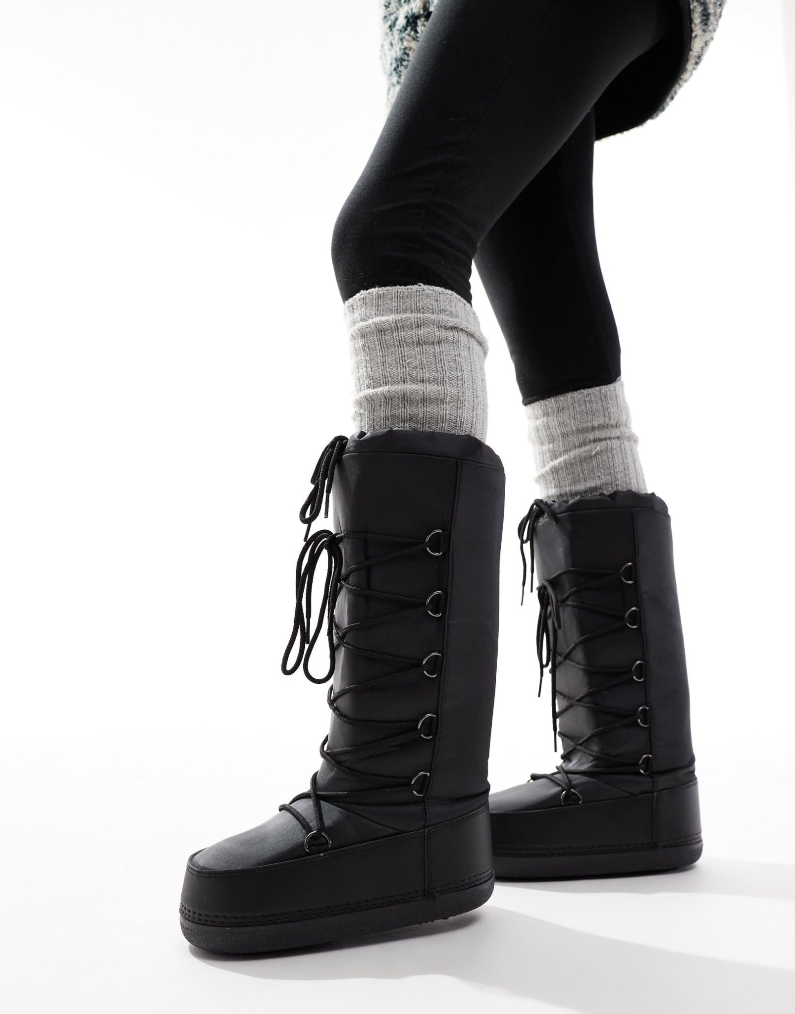 SEQWL knee high snow boots in black - ASOS Sample Sale