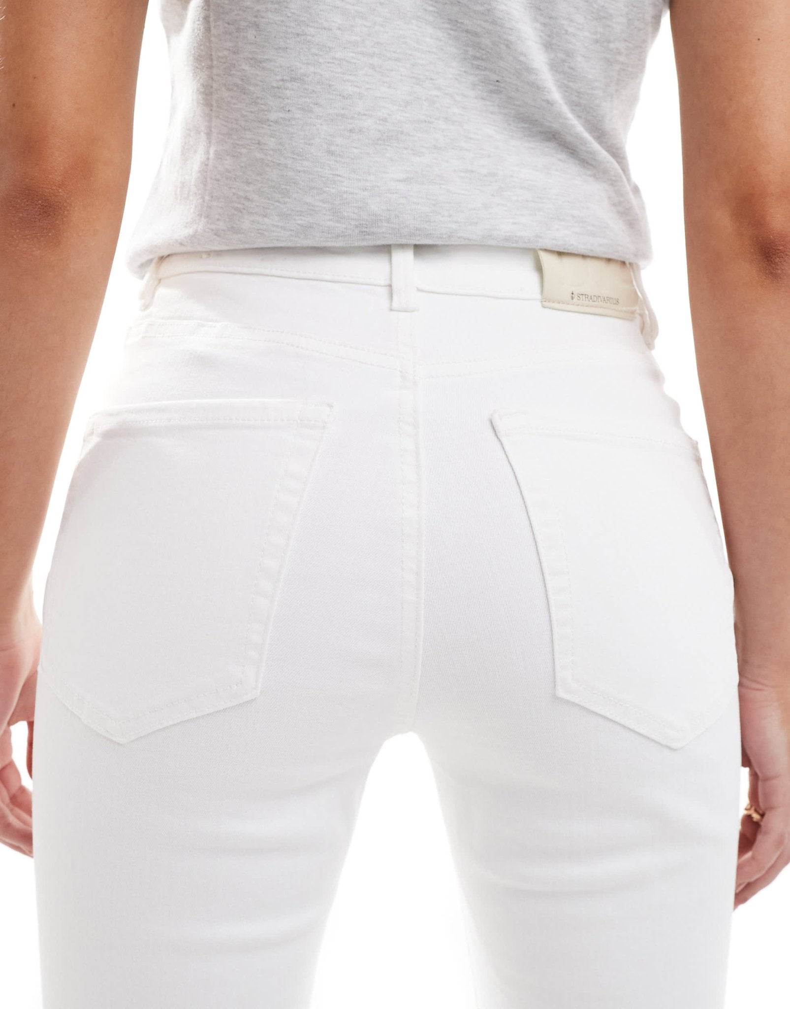 Stradivarius D74 flare slit jean in white - ASOS Sample Sale
