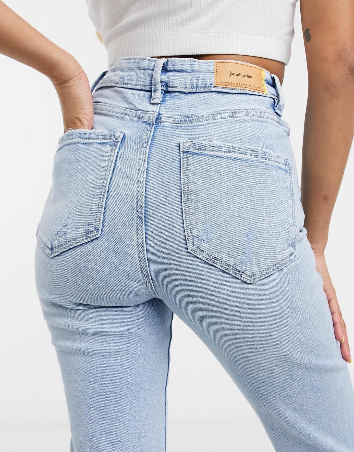 Stradivarius Petite cotton slim mom jean with stretch and rip in light blue - ASOS Sample Sale