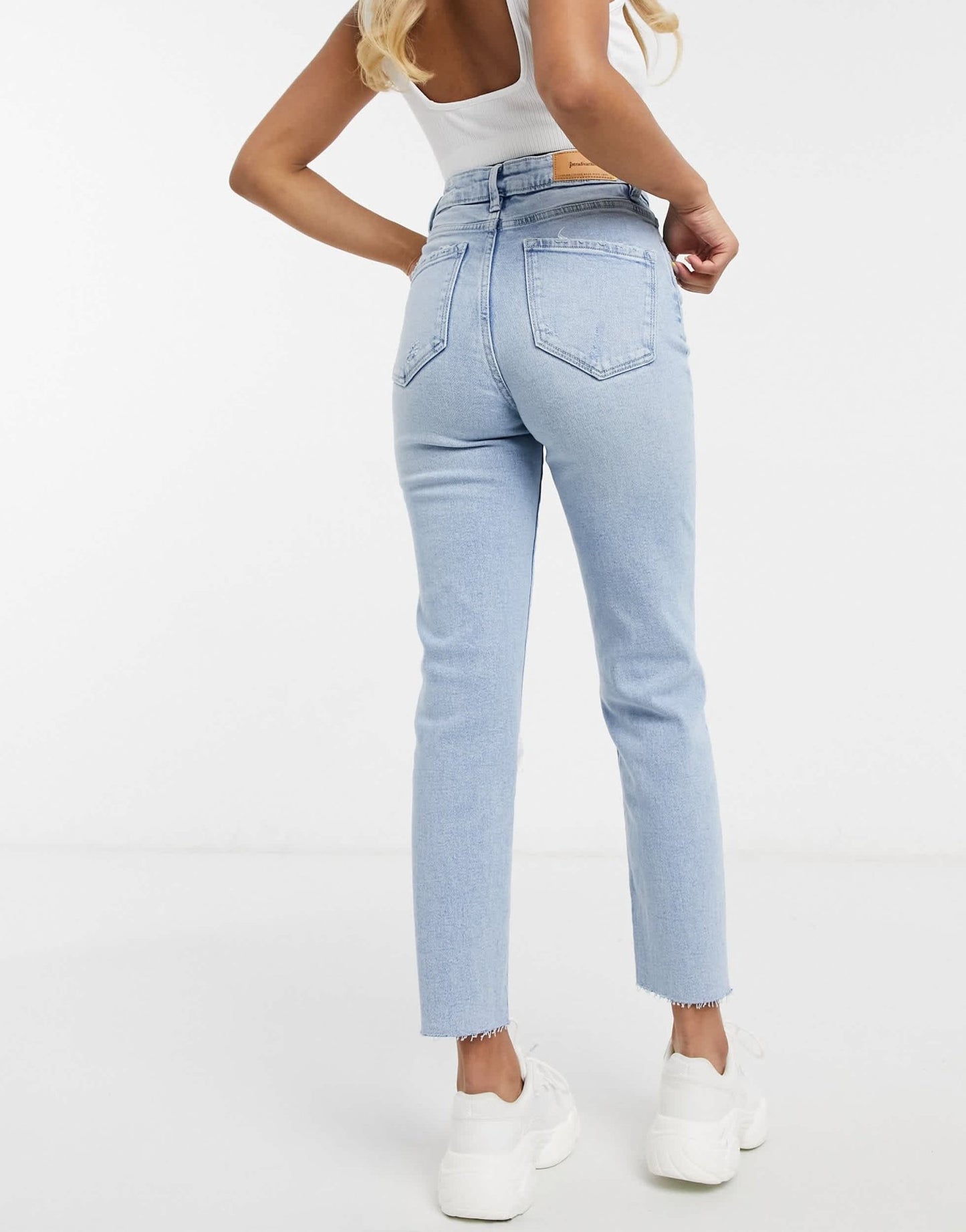 Stradivarius Petite cotton slim mom jean with stretch and rip in light blue - ASOS Sample Sale