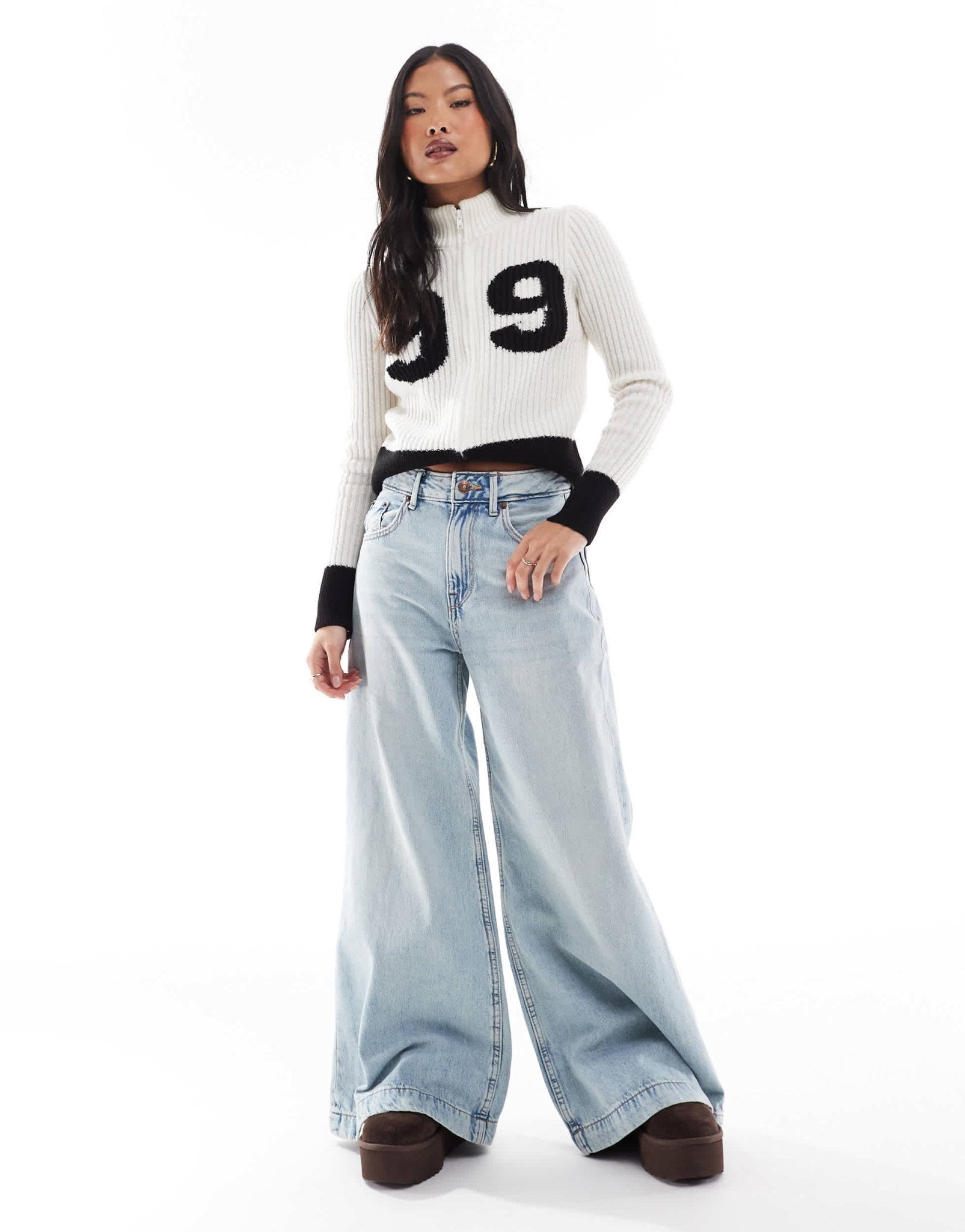 Stradivarius Petite wide flare jean in light wash blue - ASOS Sample Sale
