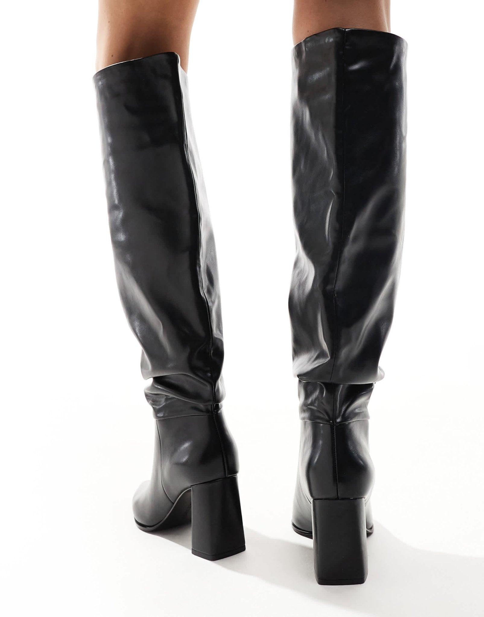 Stradivarius slouchy heeled knee high boot in black - ASOS Sample Sale