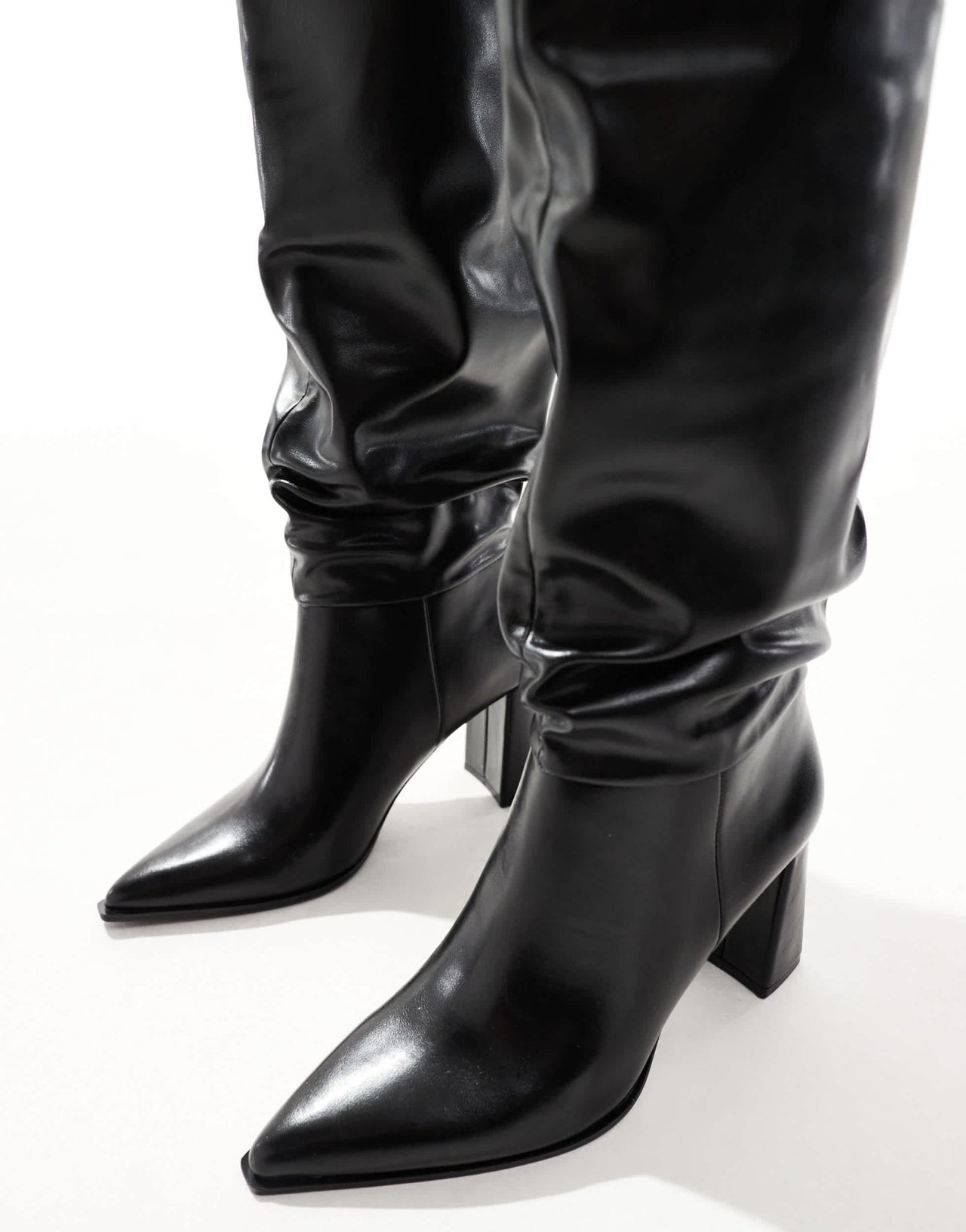 Stradivarius slouchy heeled knee high boot in black - ASOS Sample Sale