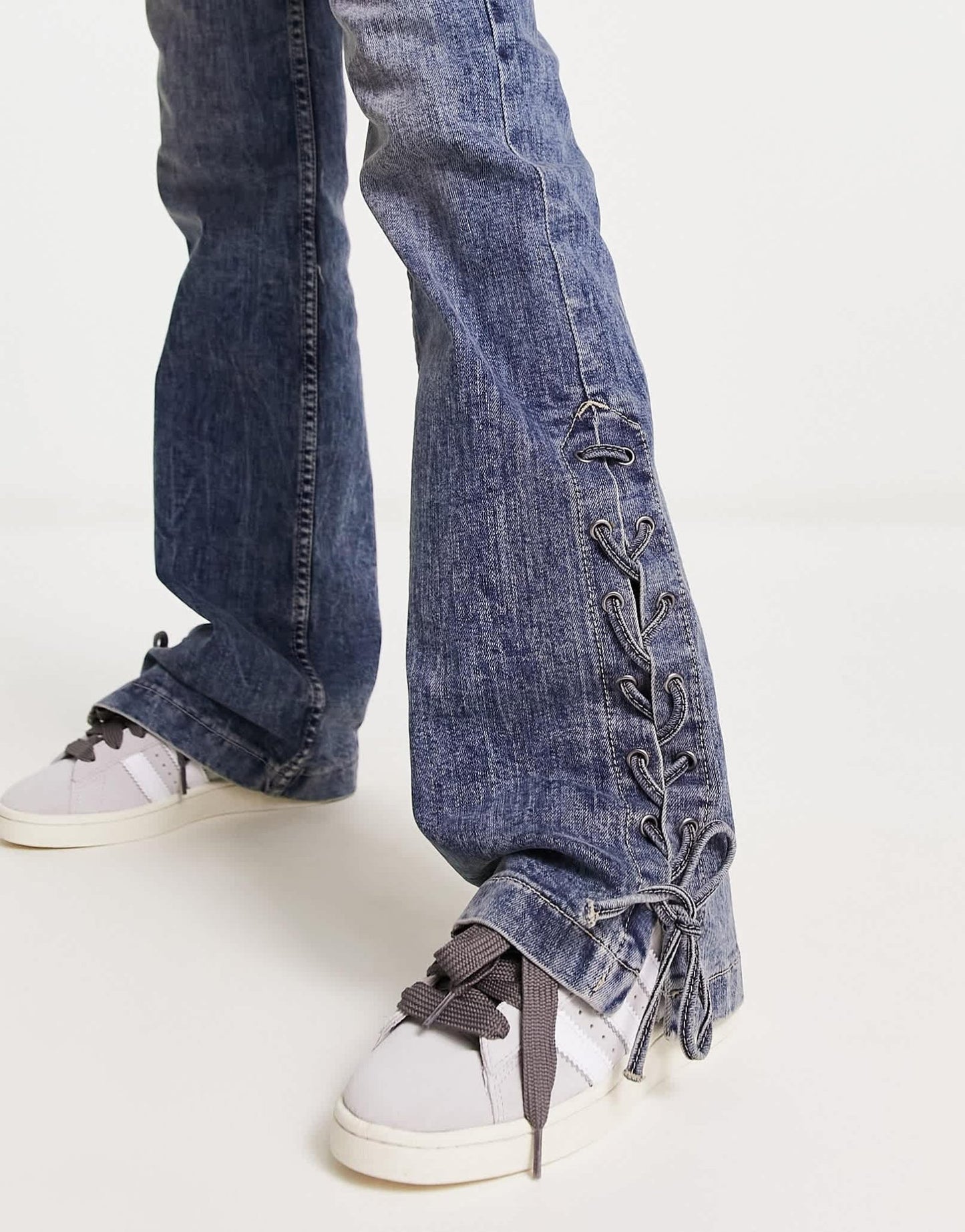 Stradivarius STR straight flare jean with lace up detail in dark wash blue - ASOS Sample Sale