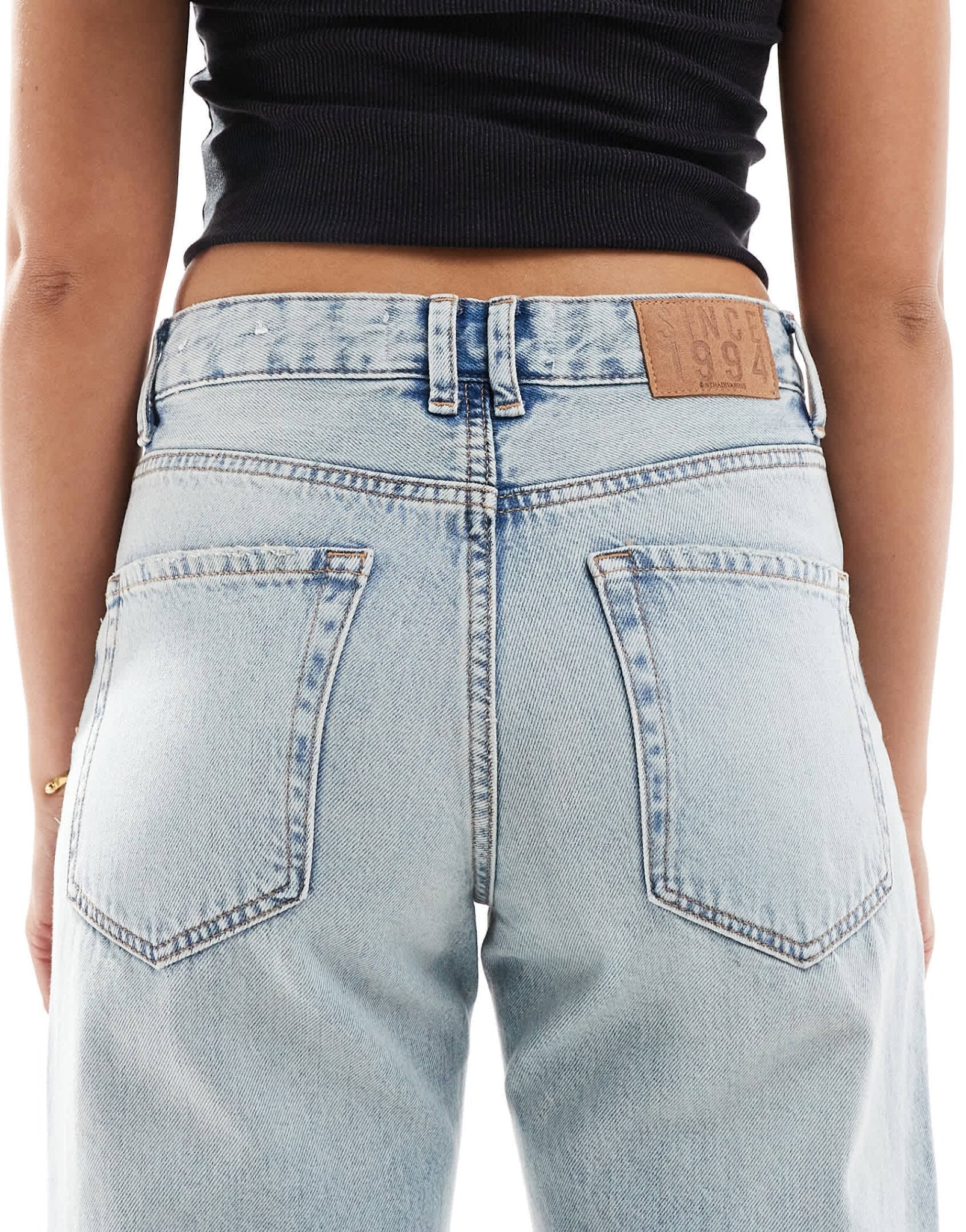 Stradivarius twist waist jean in medium wash blue - ASOS Sample Sale