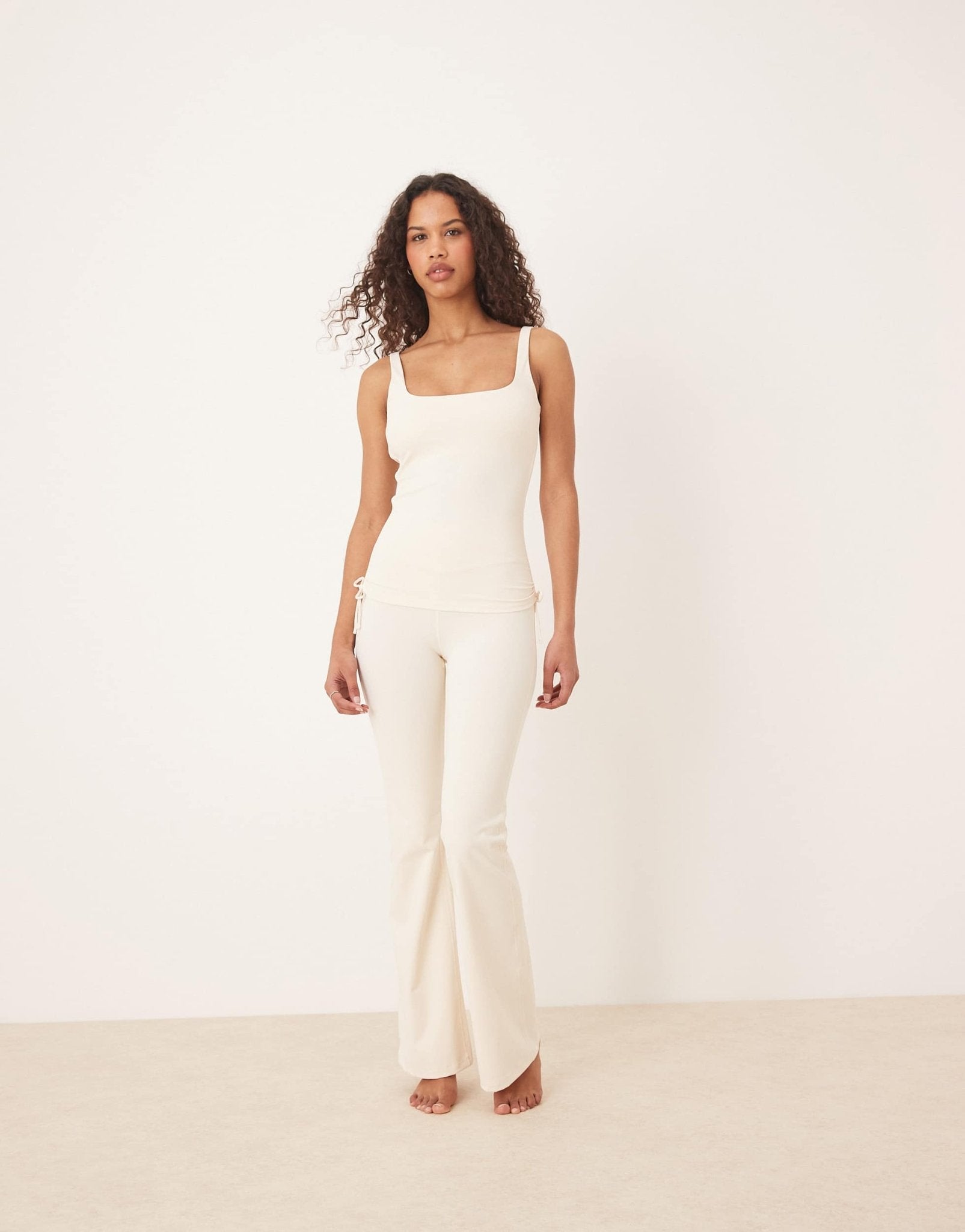 TALA DayFlex wrap high waisted flared yoga pant in cream - ASOS Sample Sale