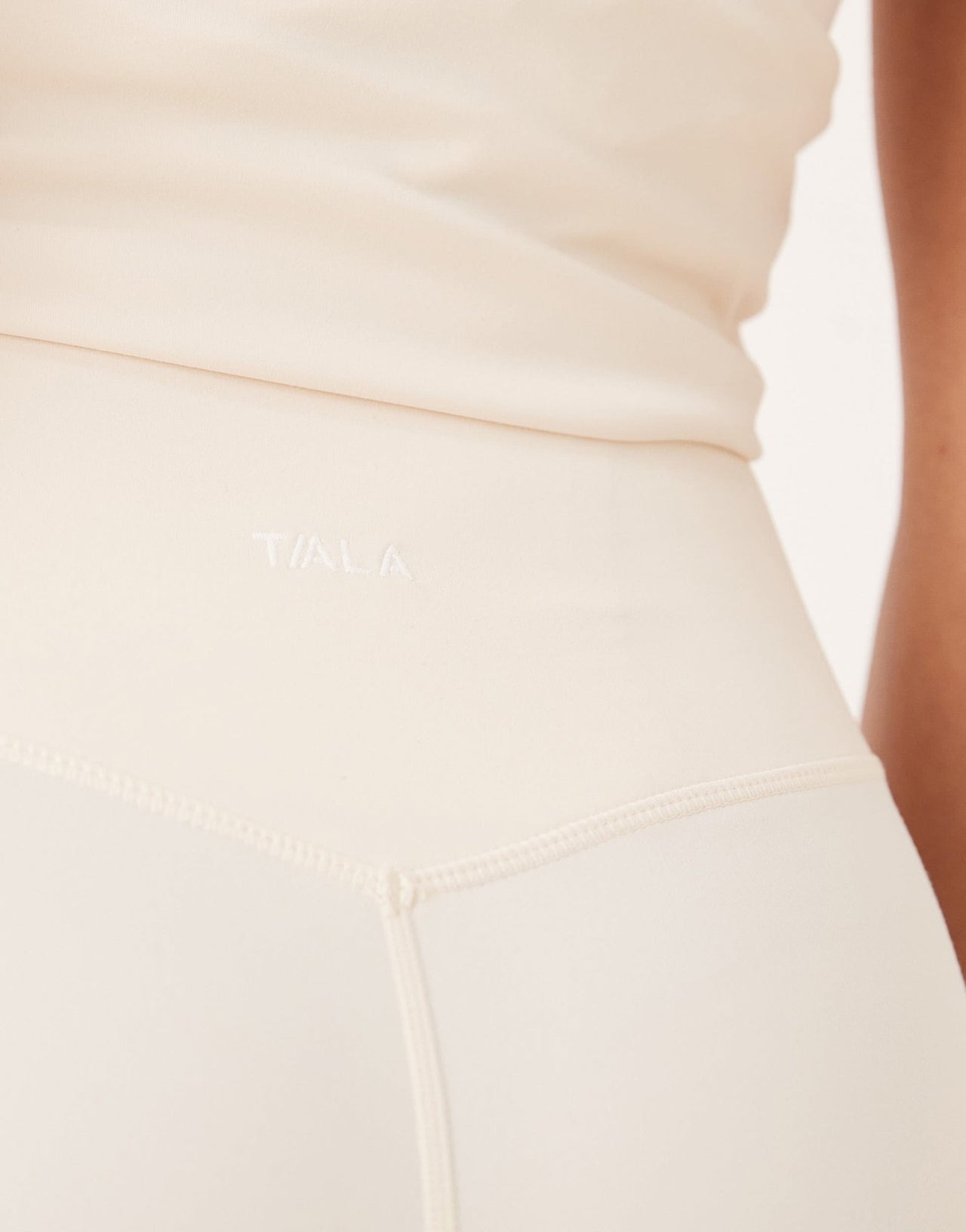 TALA DayFlex wrap high waisted flared yoga pant in cream - ASOS Sample Sale