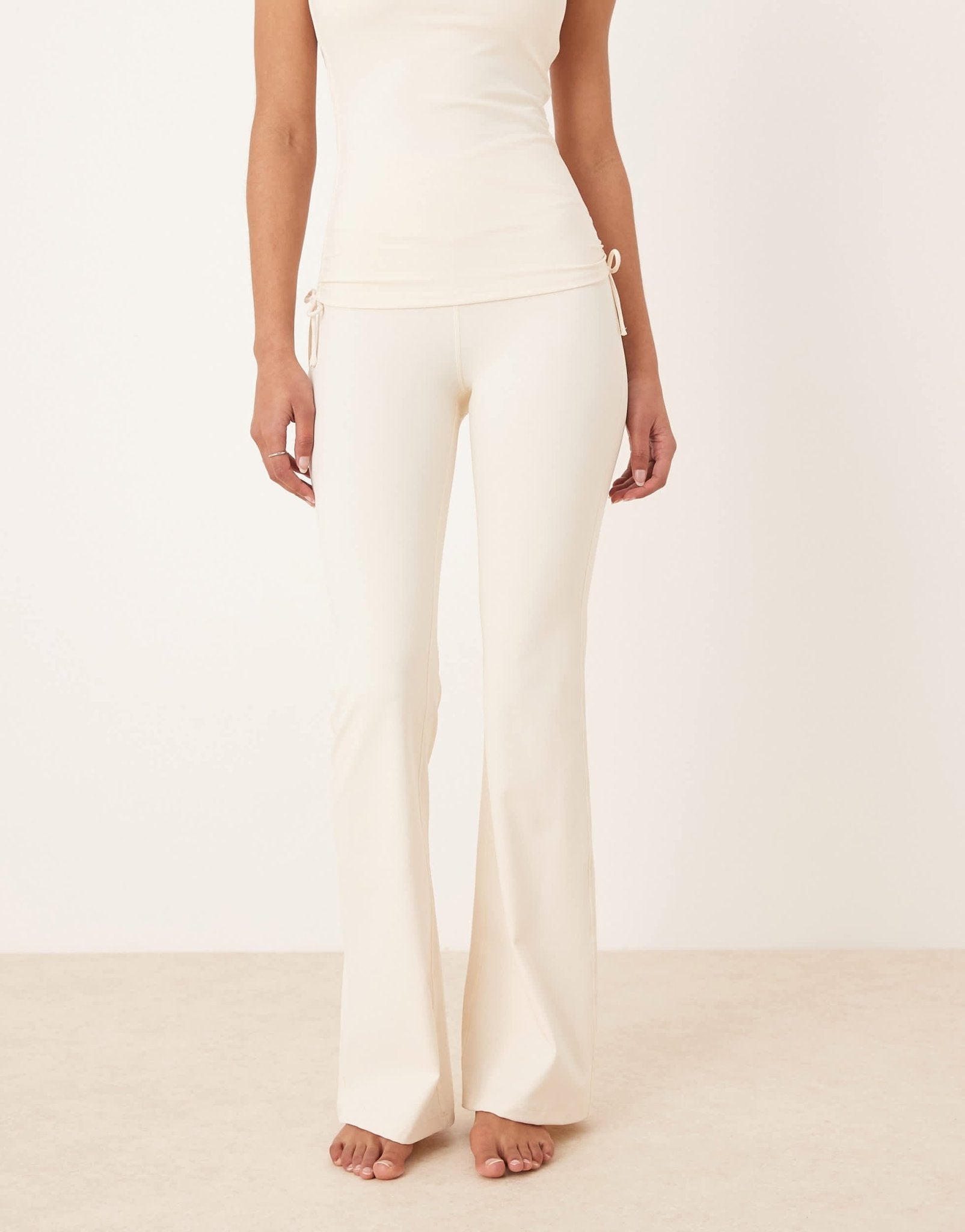 TALA DayFlex wrap high waisted flared yoga pant in cream - ASOS Sample Sale