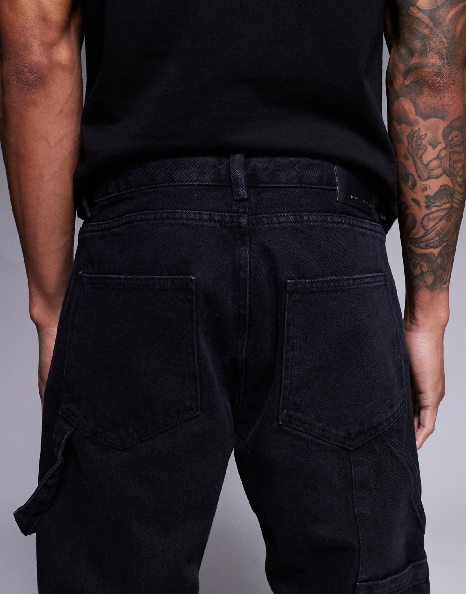 The Couture Club carpenter rivet detail jeans in black wash - ASOS Sample Sale