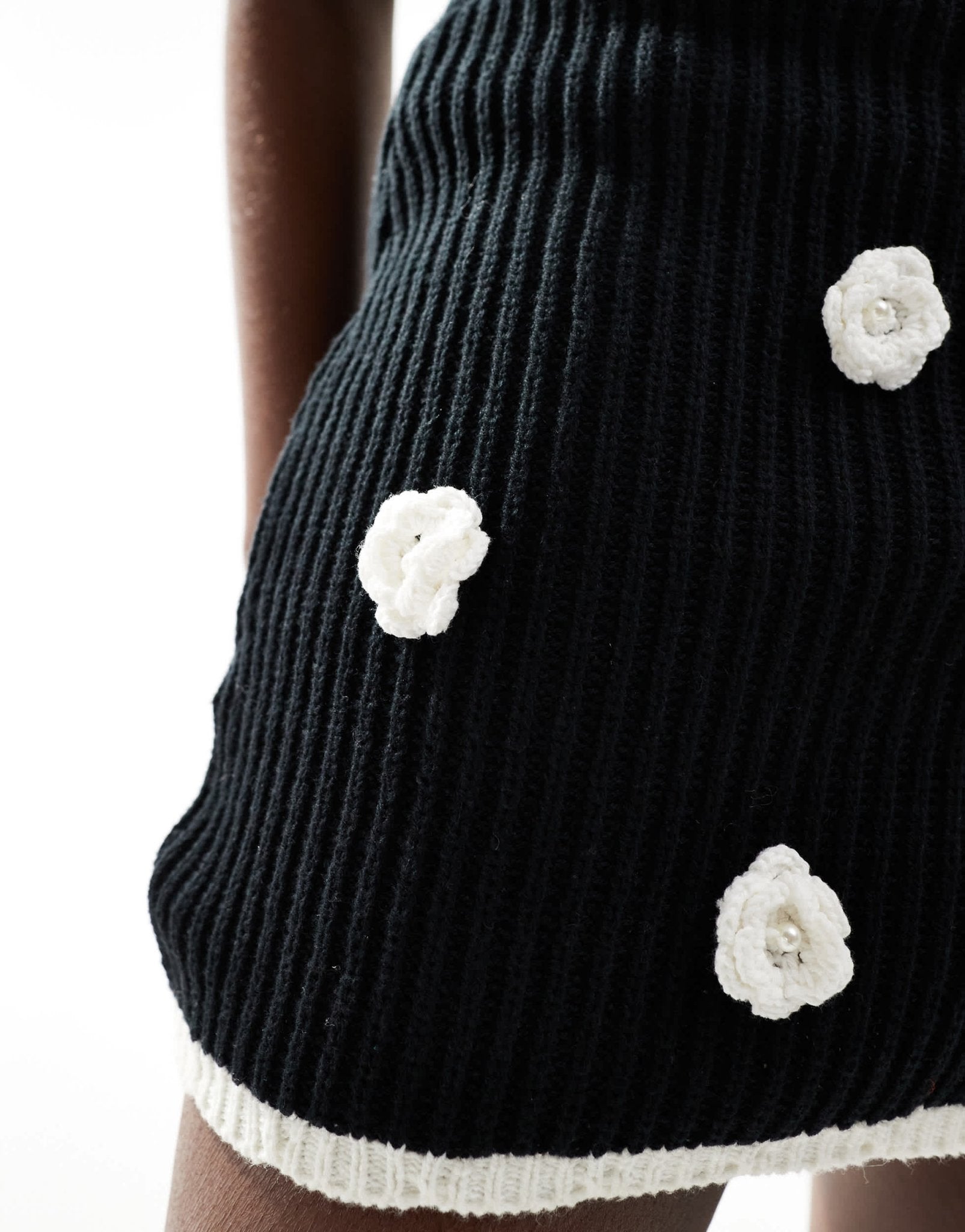 The Frolic exclusive knitted pearl flower applique beach mini skirt co - ord in black and cream - ASOS Sample Sale