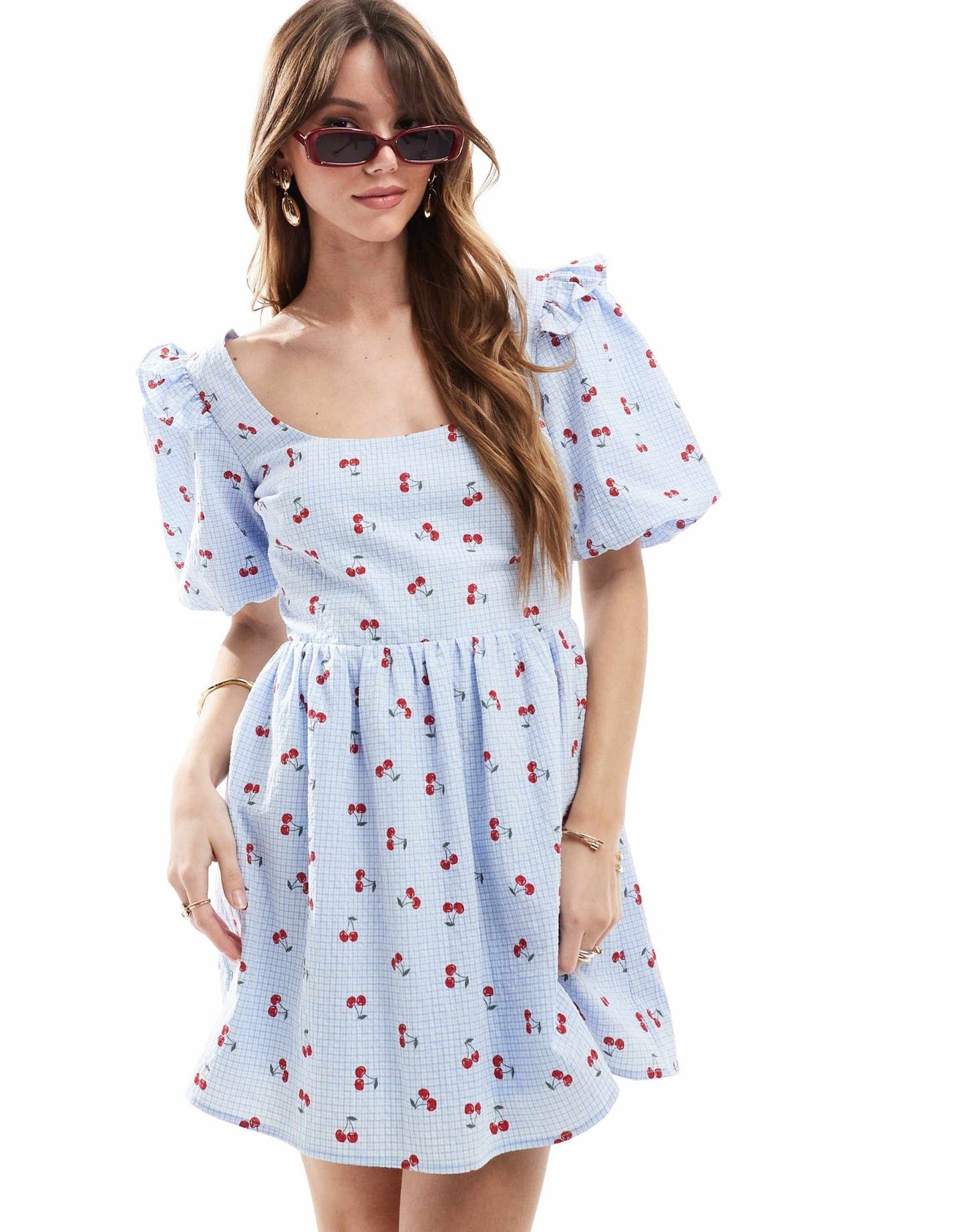 The Frolic exclusive seersucker ruffle puff sleeve shirred babydoll mini dress in blue check and cherry print - ASOS Sample Sale