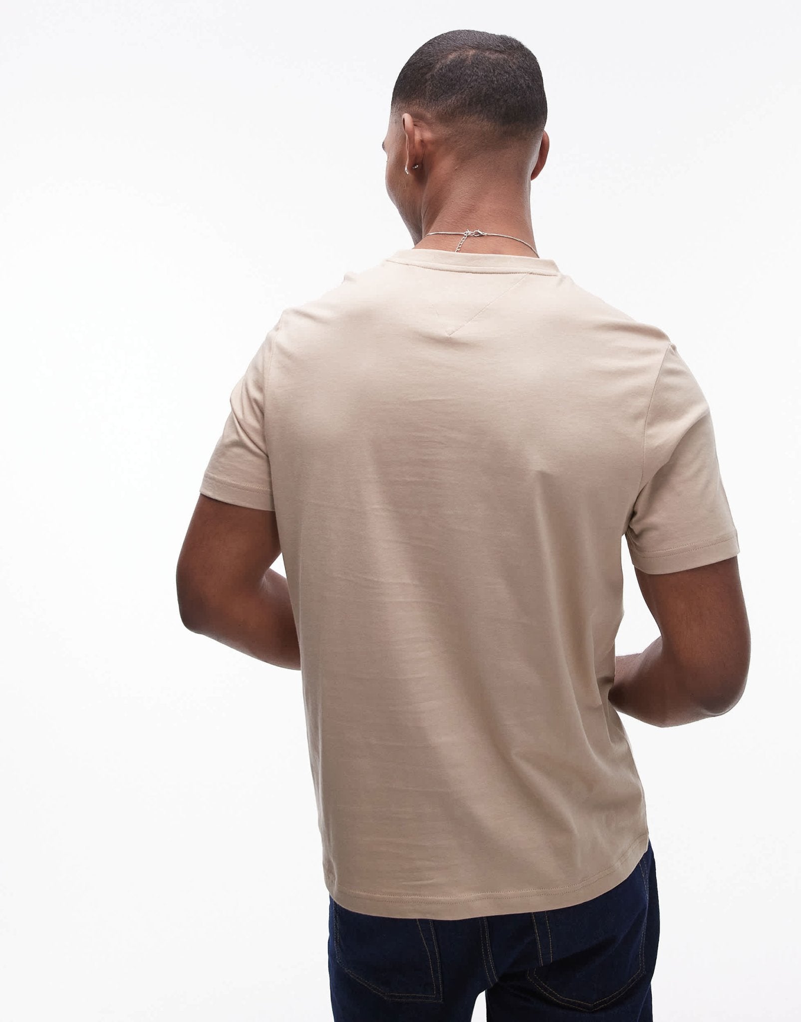 Tommy Hilfiger centre stack linear logo t-shirt in beige - ASOS Sample Sale