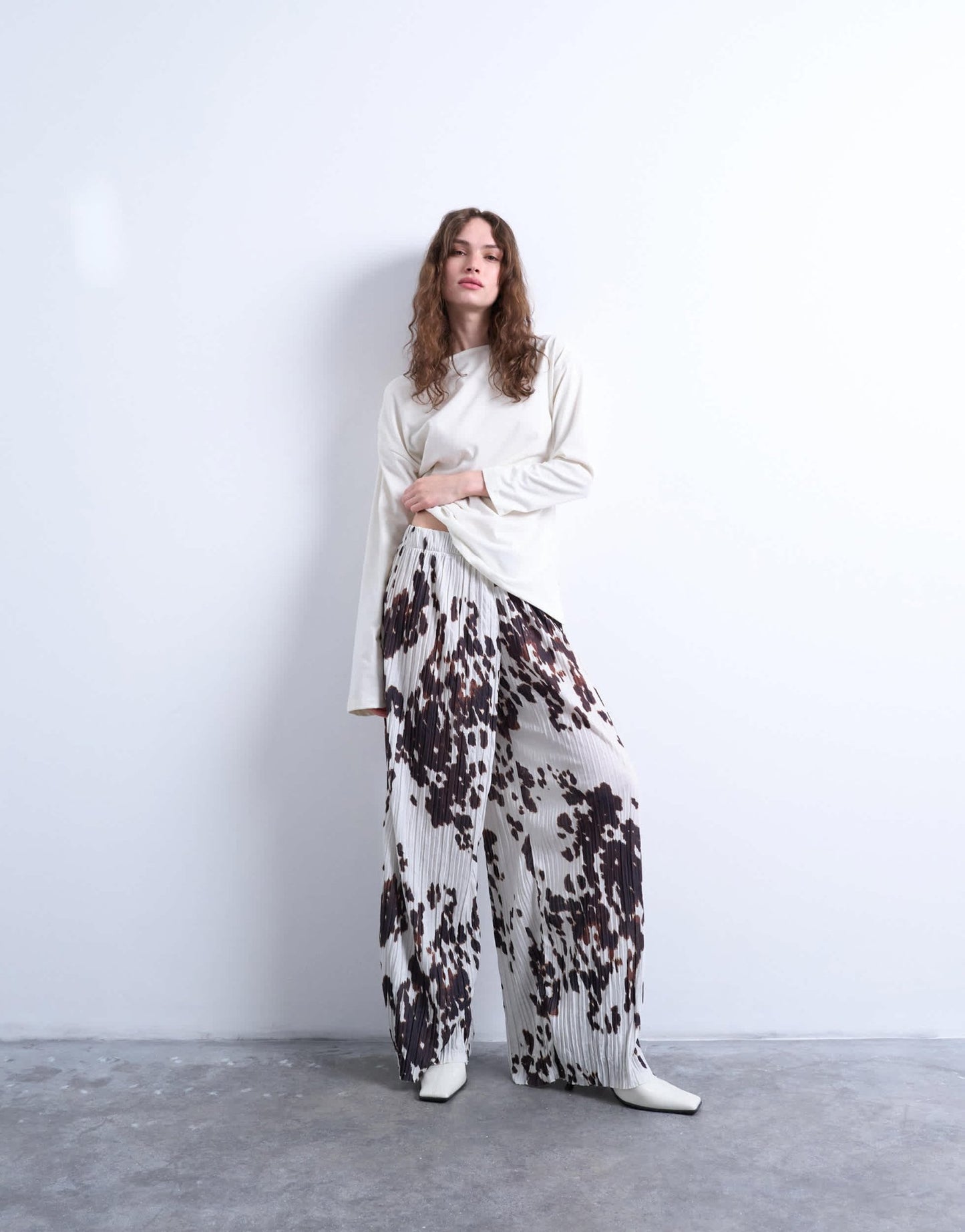 Topshop crinkle wide leg trousers in cow print - ASOS Sample Sale