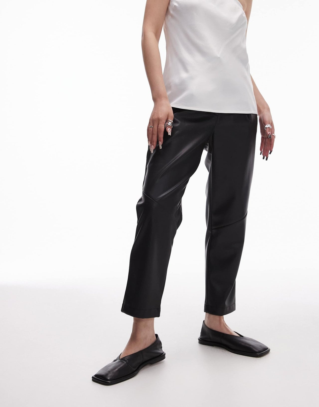 Topshop Petite faux leather peg trouser in black - ASOS Sample Sale