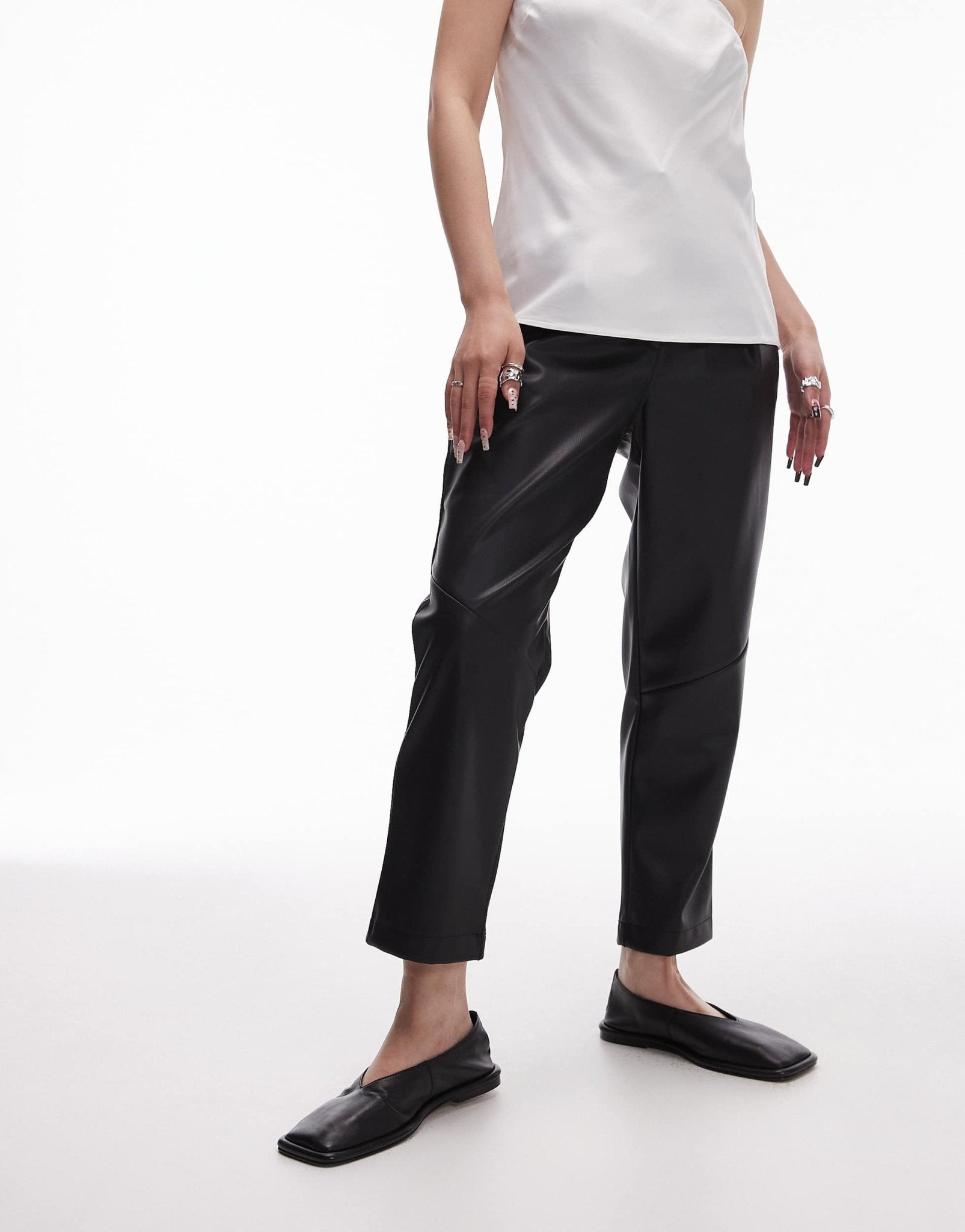 Topshop Petite faux leather peg trouser in black - ASOS Sample Sale