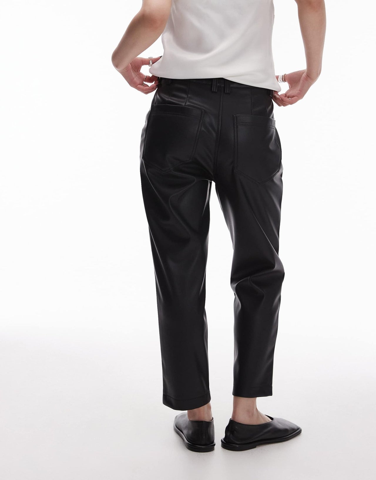 Topshop Petite faux leather peg trouser in black - ASOS Sample Sale