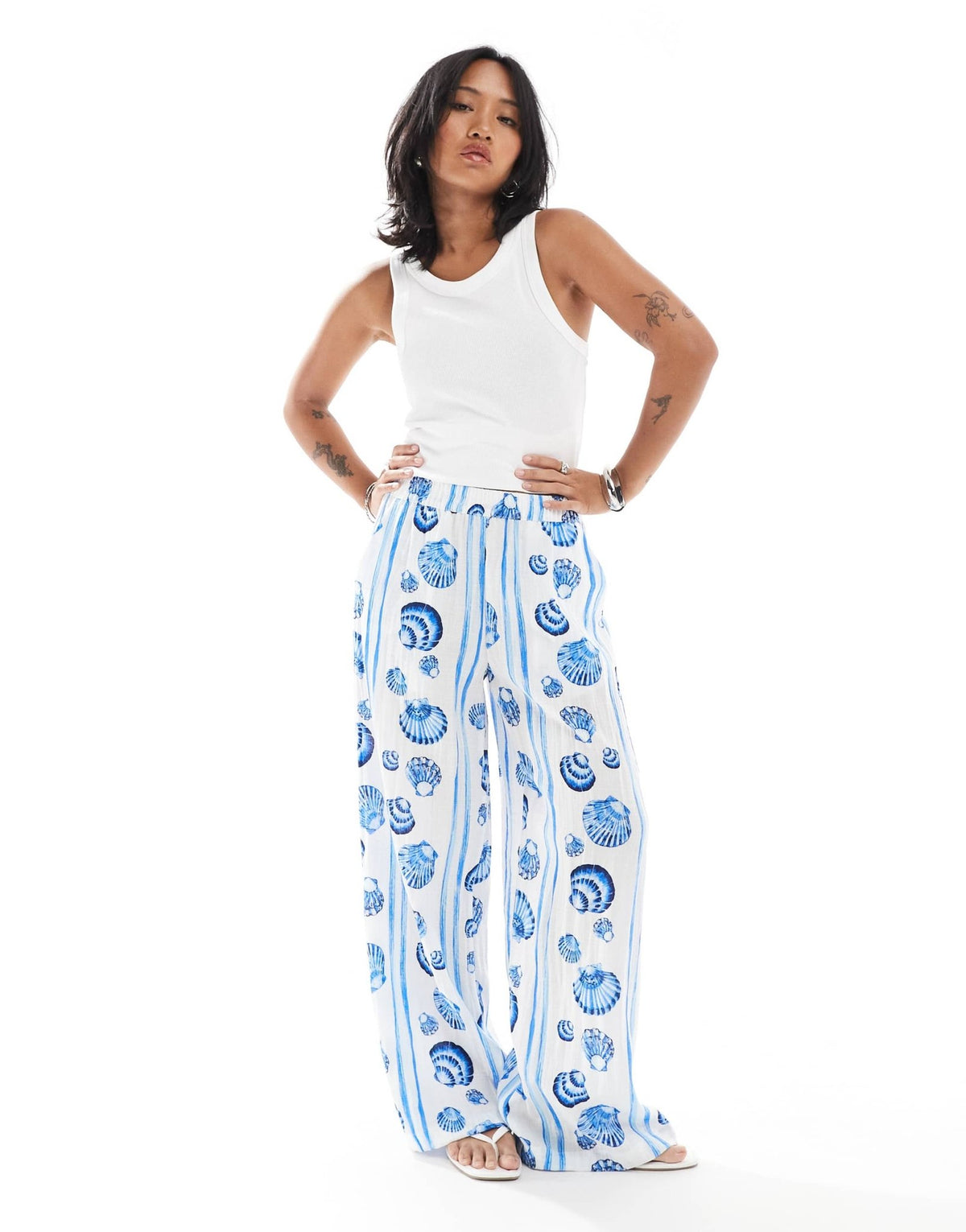Vero Moda Petite straight leg trousers in blue seashell print - ASOS Sample Sale