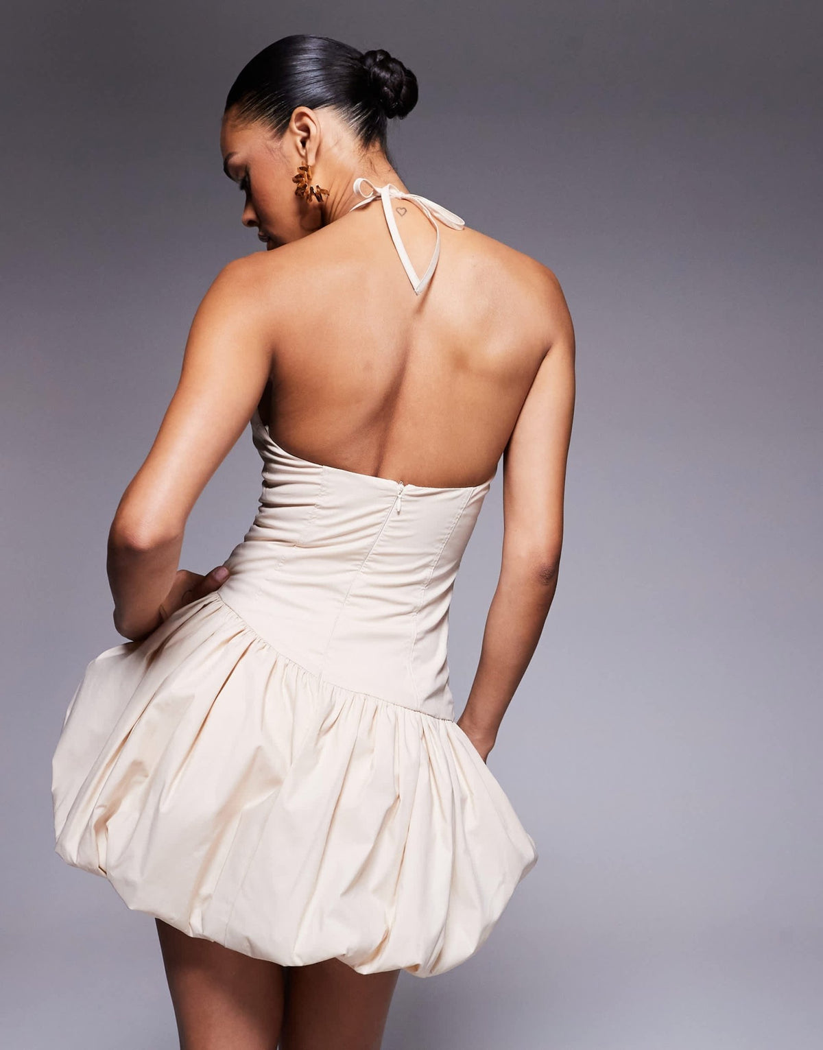 Wanderdoll Sunday poplin halterneck asymmetric bubble hem mini dress in beige - ASOS Sample Sale