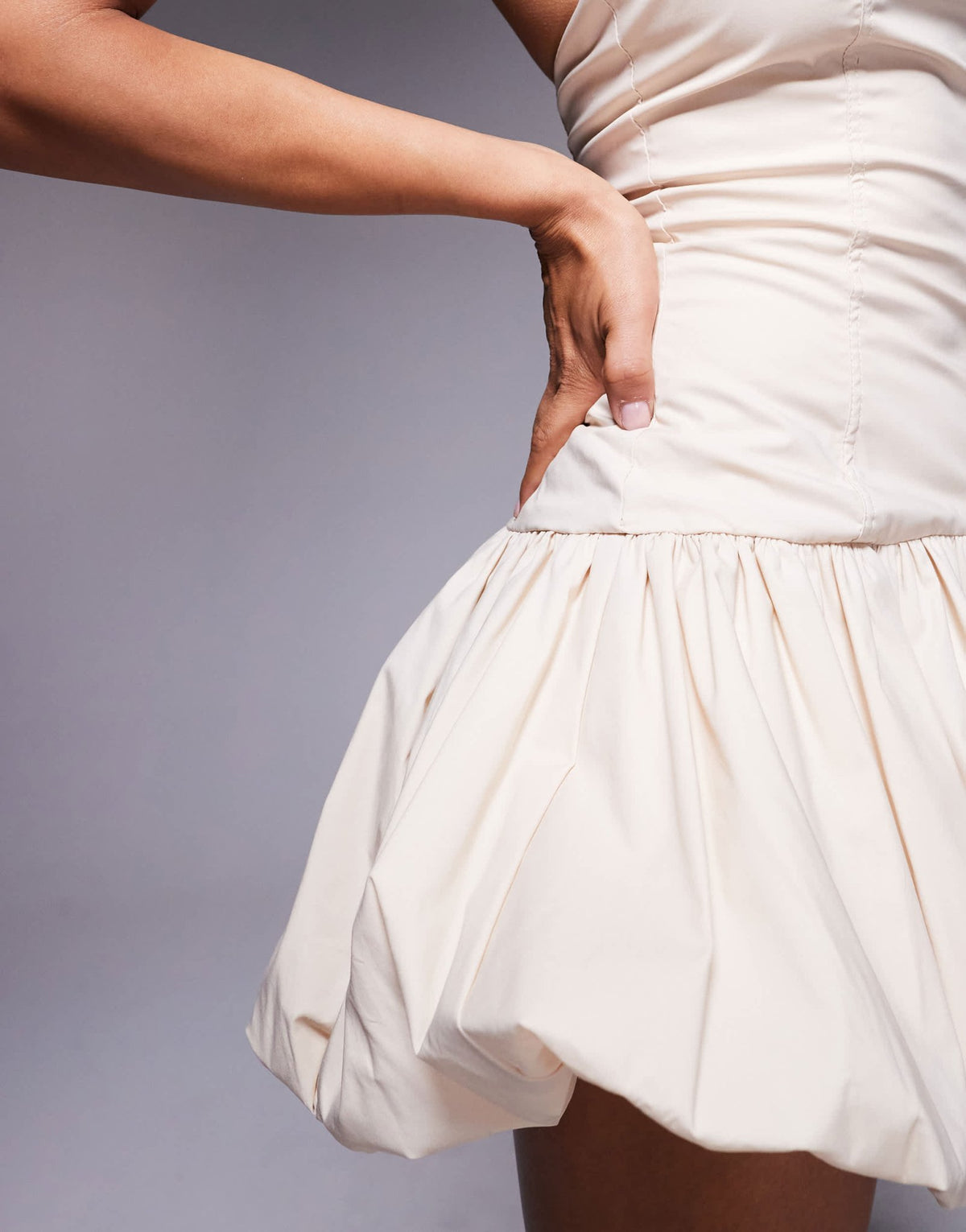 Wanderdoll Sunday poplin halterneck asymmetric bubble hem mini dress in beige - ASOS Sample Sale