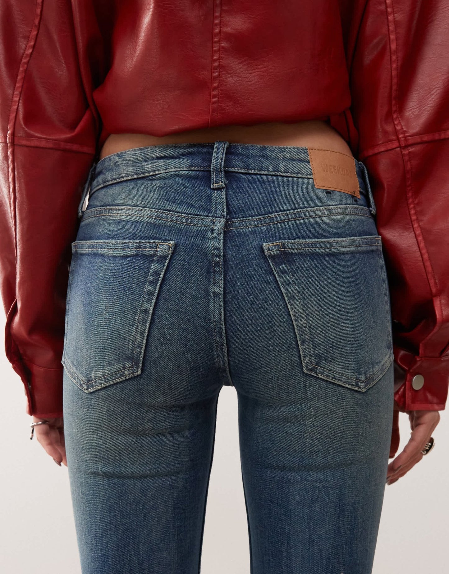 Weekday Flame low waist flared jeans in gasoline blue - ASOS Sample Sale