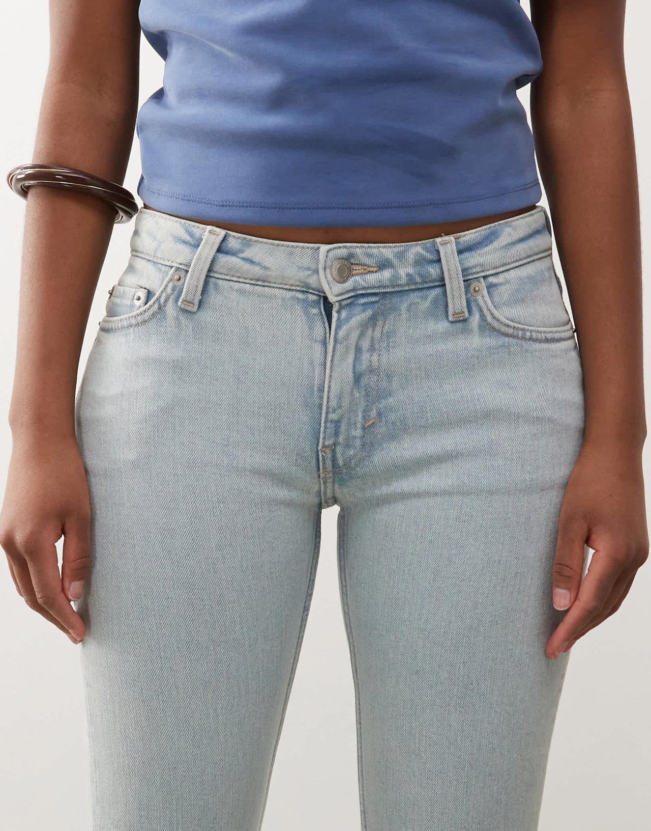 Weekday Flame low waist flared jeans in light blue - ASOS Sample Sale
