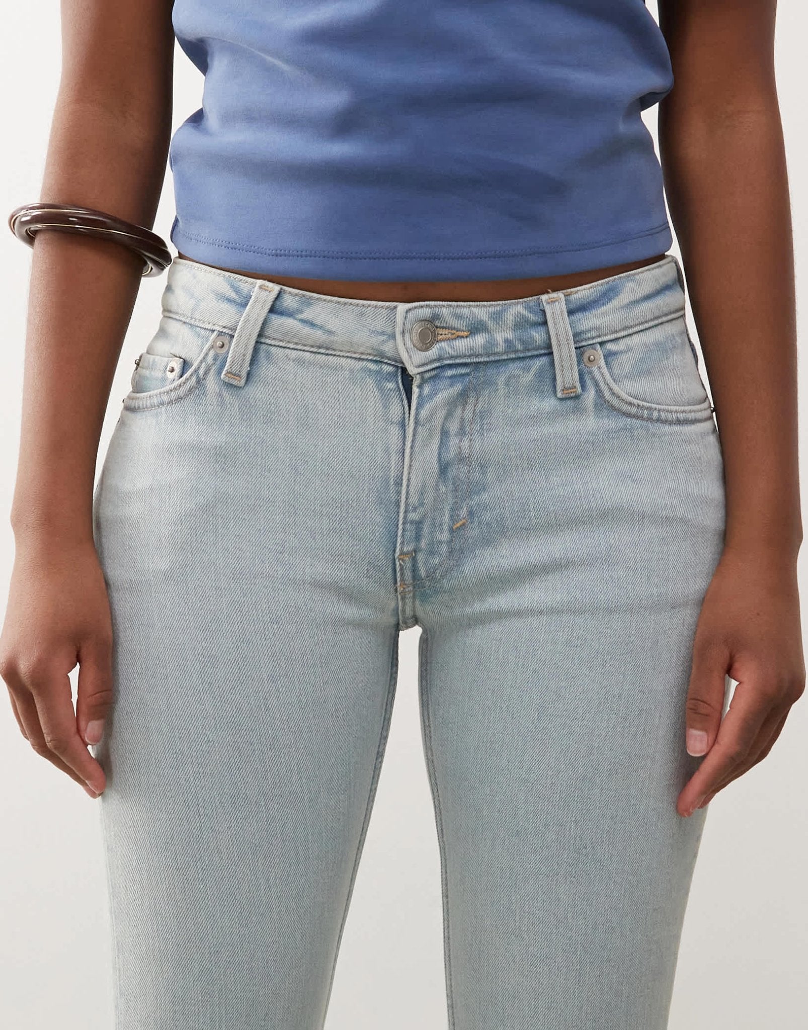 Weekday Flame low waist flared jeans in light blue - ASOS Sample Sale