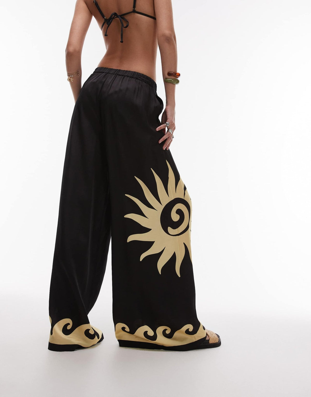 WeWoreWhat sun wave placement wide leg beach pants in black - ASOS Sample Sale