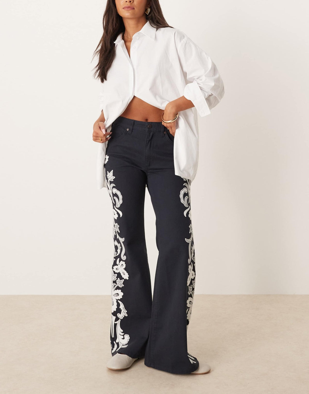Wrangler 70s flare jeans with floral embriodery in black - ASOS Sample Sale