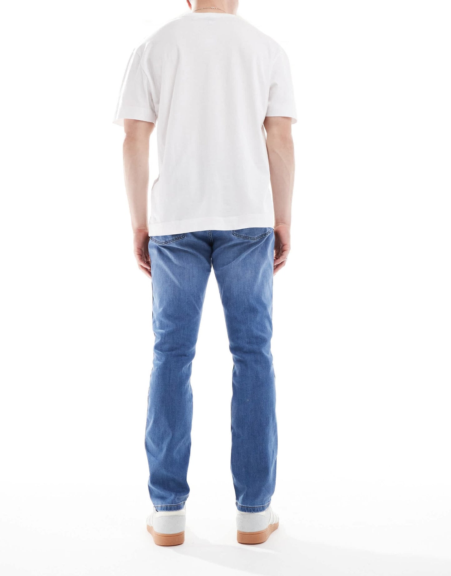 Wrangler Larston slim tapered fit jeans in mid wash blue - ASOS Sample Sale