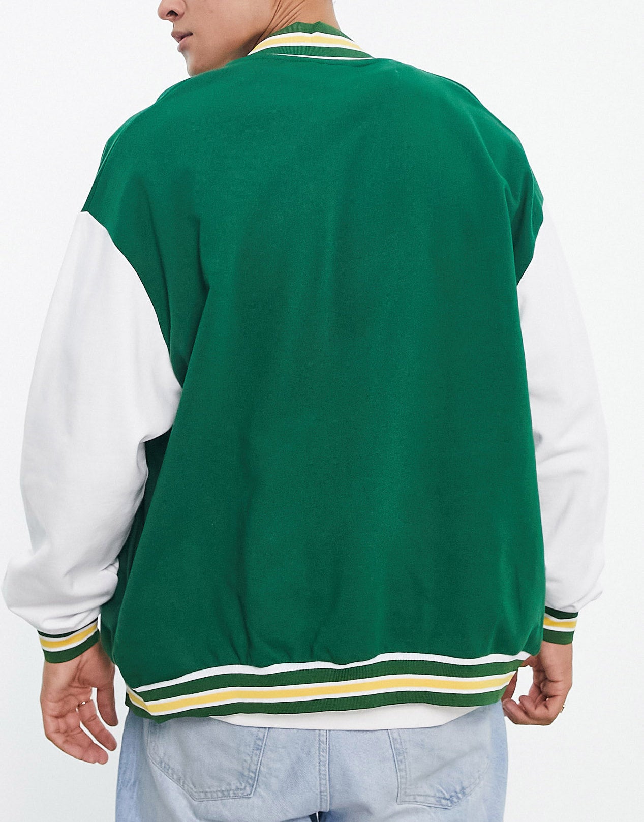 ASOS DESIGN oversized varsity bomber jacket in green and ecru cotton